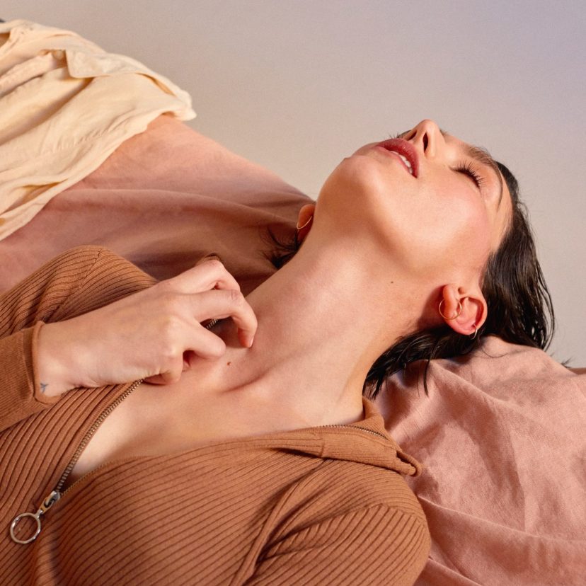 Girl lying with her head thrown back Girl lying with her head thrown back